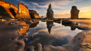 Beach rocks reflected sky dusk - david martin free wallpaper