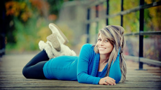 Woman lying crossed legs bokeh 2 - claire falkenstein free wallpaper