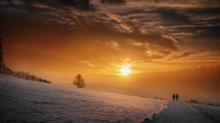 Snowy path dusk cityscape lighthouse - two person free wallpaper
