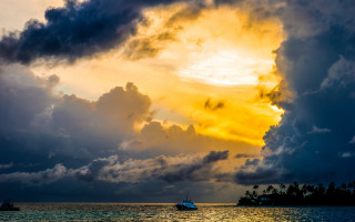 Boat water sky clouds sunset - colorful cloud free wallpaper