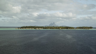 Small island houses mountain ocean - a small island free wallpaper