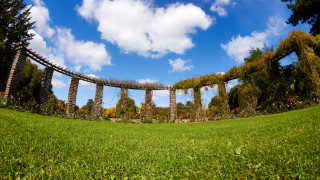 Stone arch field trees clouds - a grassy field free wallpaper