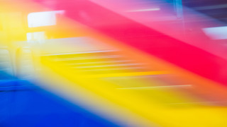 Blurry rainbow staircase blue door - a blurry image of a rainbow free wallpaper