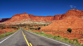 Long road mountain blue sky 2 - carl hoppe free wallpaper