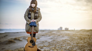 Beach guitar woman sunset horizon - a guitar free wallpaper