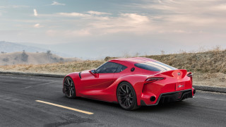 Red sports car hill sky - a hill side free wallpaper