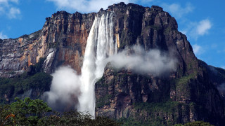 Tall waterfall clouds bridge city - massive free wallpaper