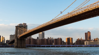Hudson bridge city mountain skyline - a city in the background and a bridge in the foreground free wallpaper