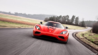 Red sports car country road - face free wallpaper