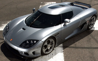Silver sports car parking lot 9 - a black stripe free wallpaper