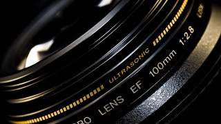 Camera lens closeup yellow stripe 3 - free technology wallpaper