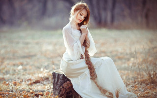Woman white dress tree stump - flowing hair free wallpaper