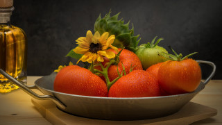 Tomatoes oil bowl wooden spoon - a wooden cutting board free wallpaper