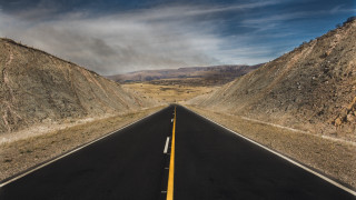 Long road mountain cloudy sky 3 - the side of the road free wallpaper