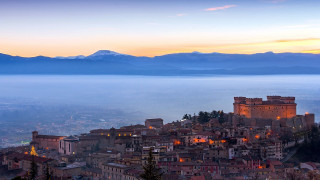 Castle city sunset mountains water - the background and a body of water free wallpaper