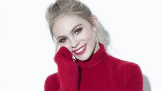 Woman smiling ponytail red sweater - a red sweater free wallpaper