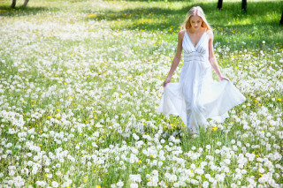 Woman flower field white dress - constance copeman free wallpaper
