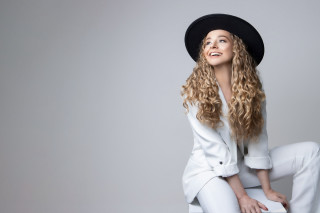 Woman blonde hat sitting blue - a stool free wallpaper