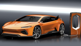 Futuristic orange car charging dark - fan qi free wallpaper