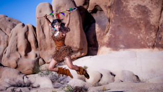 Woman jumping dress rock formation - daphne mcclure free wallpaper