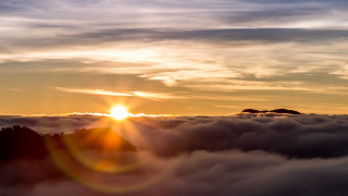 Sunset mountain clouds bird lens - a sun setting free wallpaper