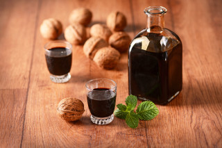 Liquid bottle glass nuts wooden - a green leaf free wallpaper