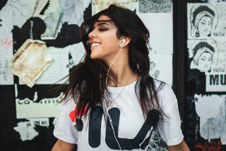 Ella guru woman earbuds posters - a phone free wallpaper