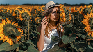 Woman hat sunflowers autumn fire - a woman in a hat free wallpaper