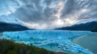 Glacier lake mountains clouds ecological - the middle of a lake free wallpaper