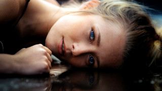 Young girl laying on ground - a young girl free wallpaper