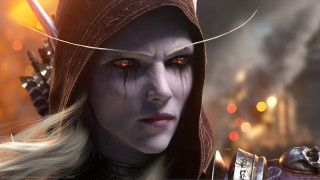 Woman red eyes hood sword - her hand and a city in the background free wallpaper