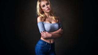 Woman crossed arms portrait blonde - a picture in a studio setting free wallpaper