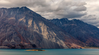 Mountain range island water cloudy - a small island in the middle of the water free wallpaper
