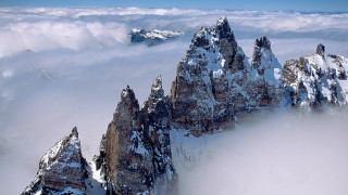 Snowy mountain range cloudy sky 3 - a few mountain free wallpaper