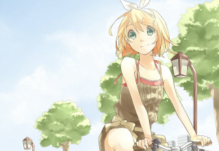 Girl riding bike street tree - a bunny free wallpaper