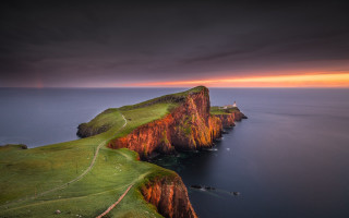 Cliff ocean sunset lighthouse tilt - a lighthouse free wallpaper