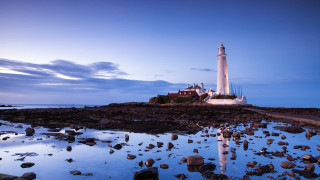 Lighthouse rocky shore ocean sunset - adobe lightroom free wallpaper