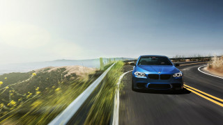 Blue car hillside fenced mountain - a blue car free wallpaper