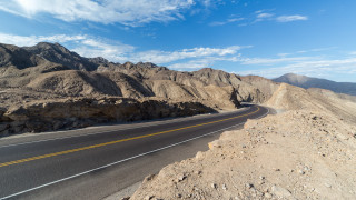 Desert road mountain blue sky 2 - a road in the desert free wallpaper