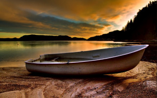 Boat shore lake sunset dramatic - dramatic free wallpaper