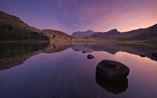 Lake rock mountains sunset purple - free landscape wallpaper