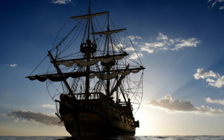 Sailing ship sunset ocean sunlight - shining free wallpaper