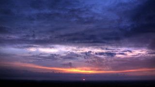 Sunset clouds sunrays horizon cityscape - a few cloud free wallpaper