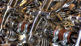 Metal assemblage wheels springs blurry - metal free wallpaper