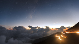 Mountain clouds stars road lights - a sky full free wallpaper