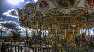 Carousel horses sky clouds sun - side and a sky background free wallpaper
