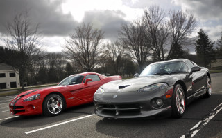 Two cars parking lot cloudy - f 8 aperture free wallpaper