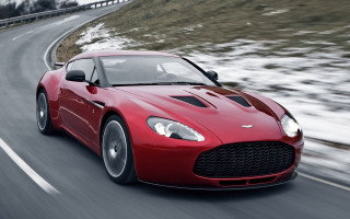 Red sports car driving snow 2 - ahmed yacoubi free wallpaper