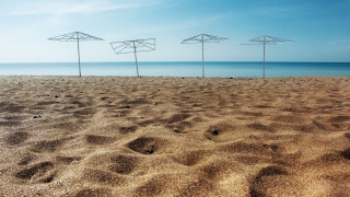 Beach umbrellas ocean blue sky - a surrealist painting free wallpaper