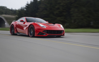 Red sports car driving tunnel - a road next free wallpaper